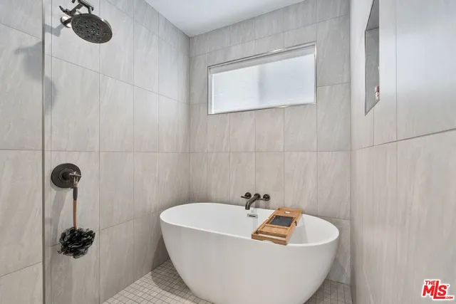a bathroom with a sink and bathtub