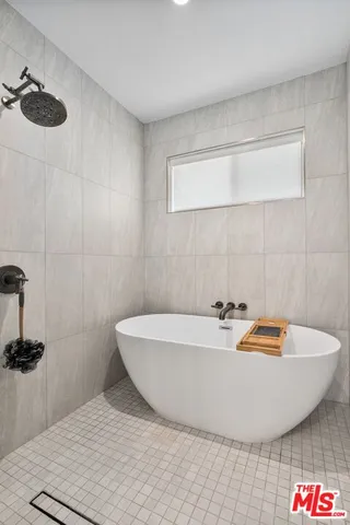 a bathroom with a sink and a bathtub