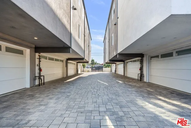 a view of an empty room with windows