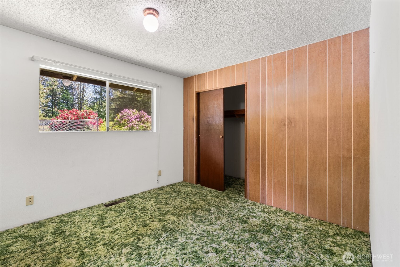 155 Bonell Road Randle, WA 98377 - Photo 22 of 38 an empty room with painting on the wall