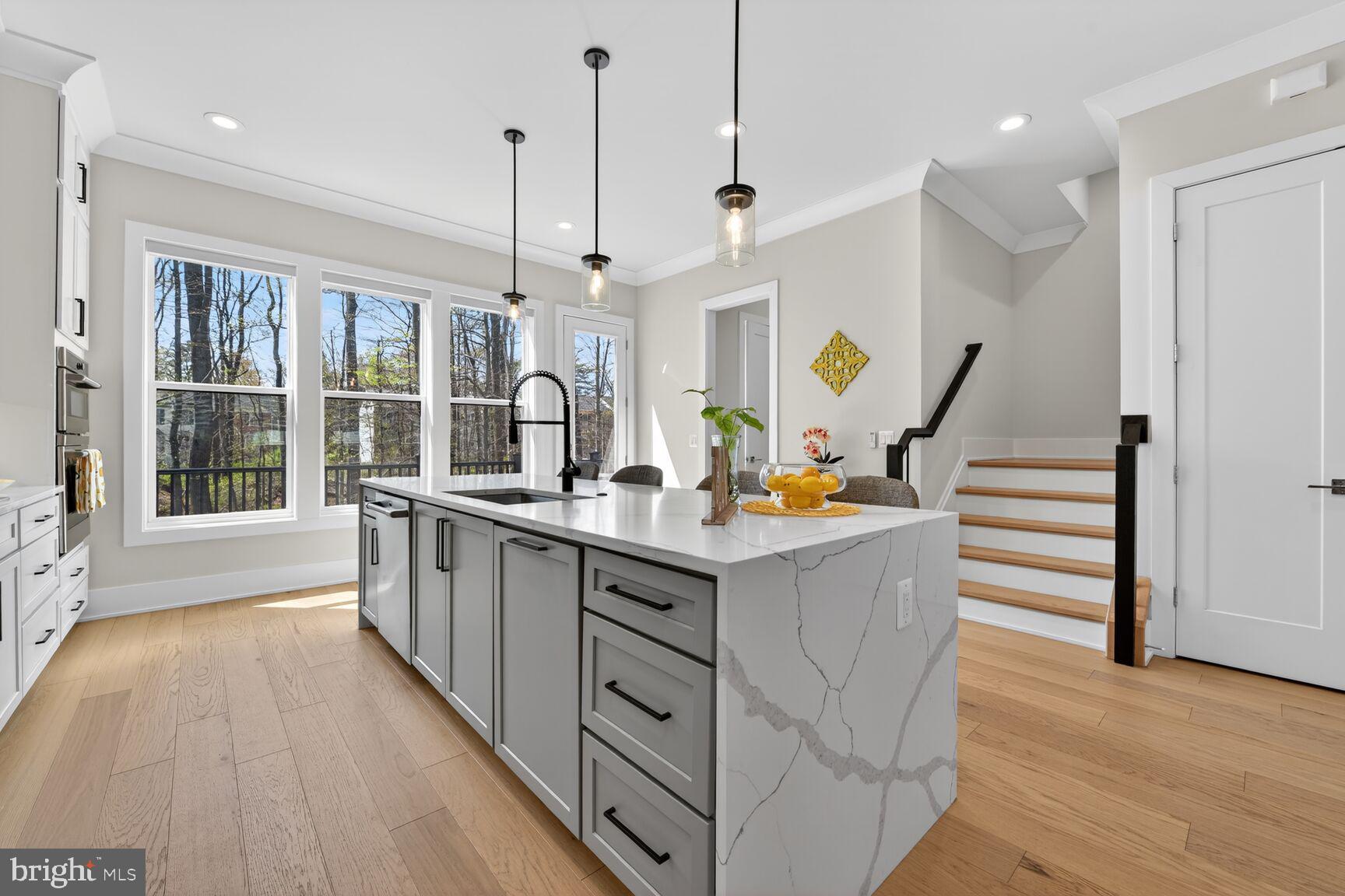 14665 Battery Ridge Lane Centreville, VA 20120 - Photo 11 of 66 a kitchen with counter top space and wooden floor