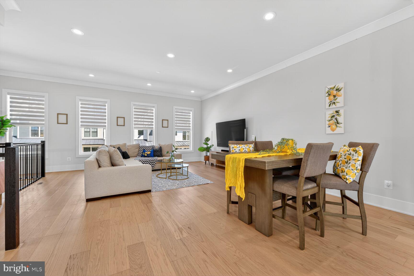 14665 Battery Ridge Lane Centreville, VA 20120 - Photo 17 of 66 a living room with furniture and a flat screen tv