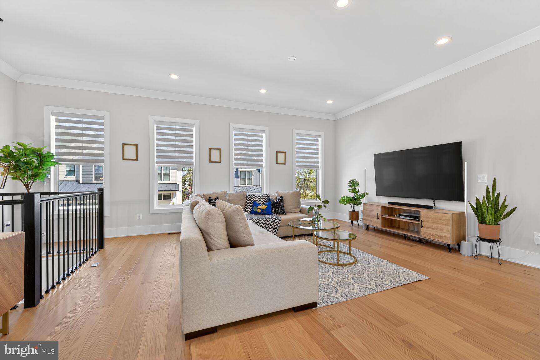 14665 Battery Ridge Lane Centreville, VA 20120 - Photo 19 of 66 a living room with furniture and a flat screen tv