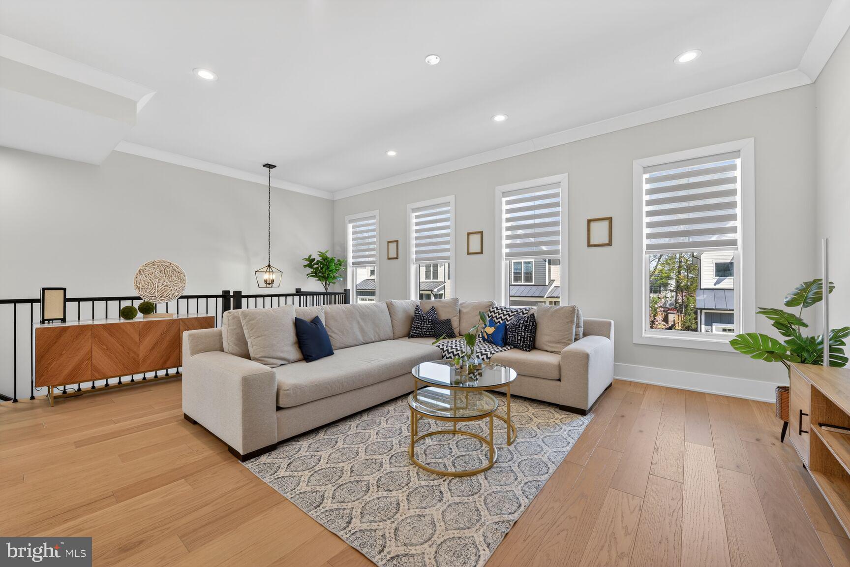 14665 Battery Ridge Lane Centreville, VA 20120 - Photo 20 of 66 a living room with furniture and wooden floor