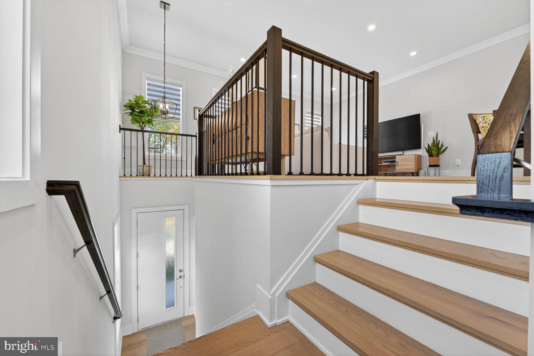 14665 Battery Ridge Lane Centreville, VA 20120 - Photo 26 of 66 a view of entryway and hall with wooden floor