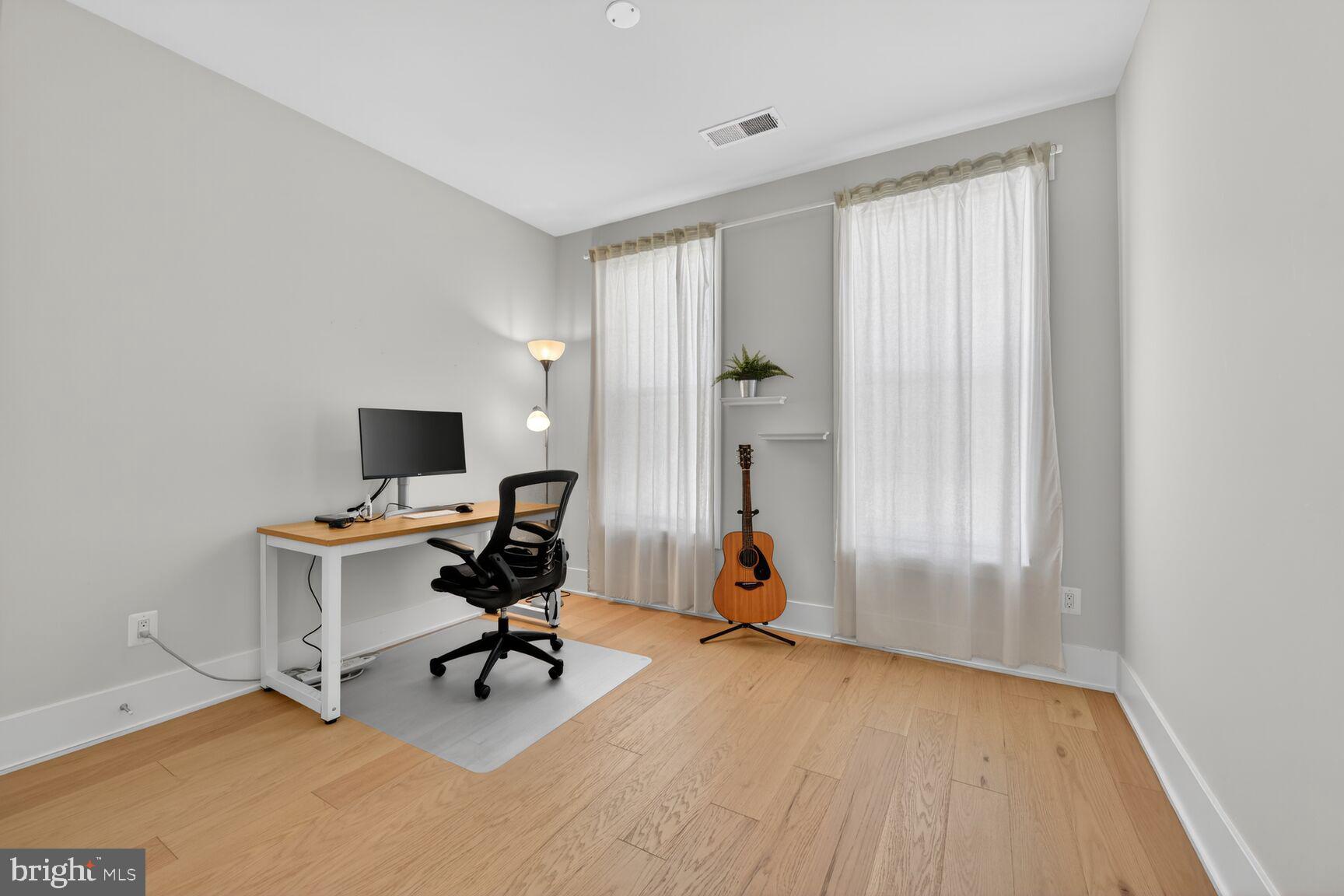 14665 Battery Ridge Lane Centreville, VA 20120 - Photo 34 of 66 a view of a workspace with furniture and a window