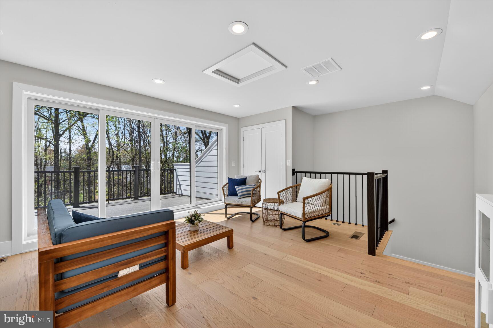 14665 Battery Ridge Lane Centreville, VA 20120 - Photo 39 of 66 a living room with furniture and a large window