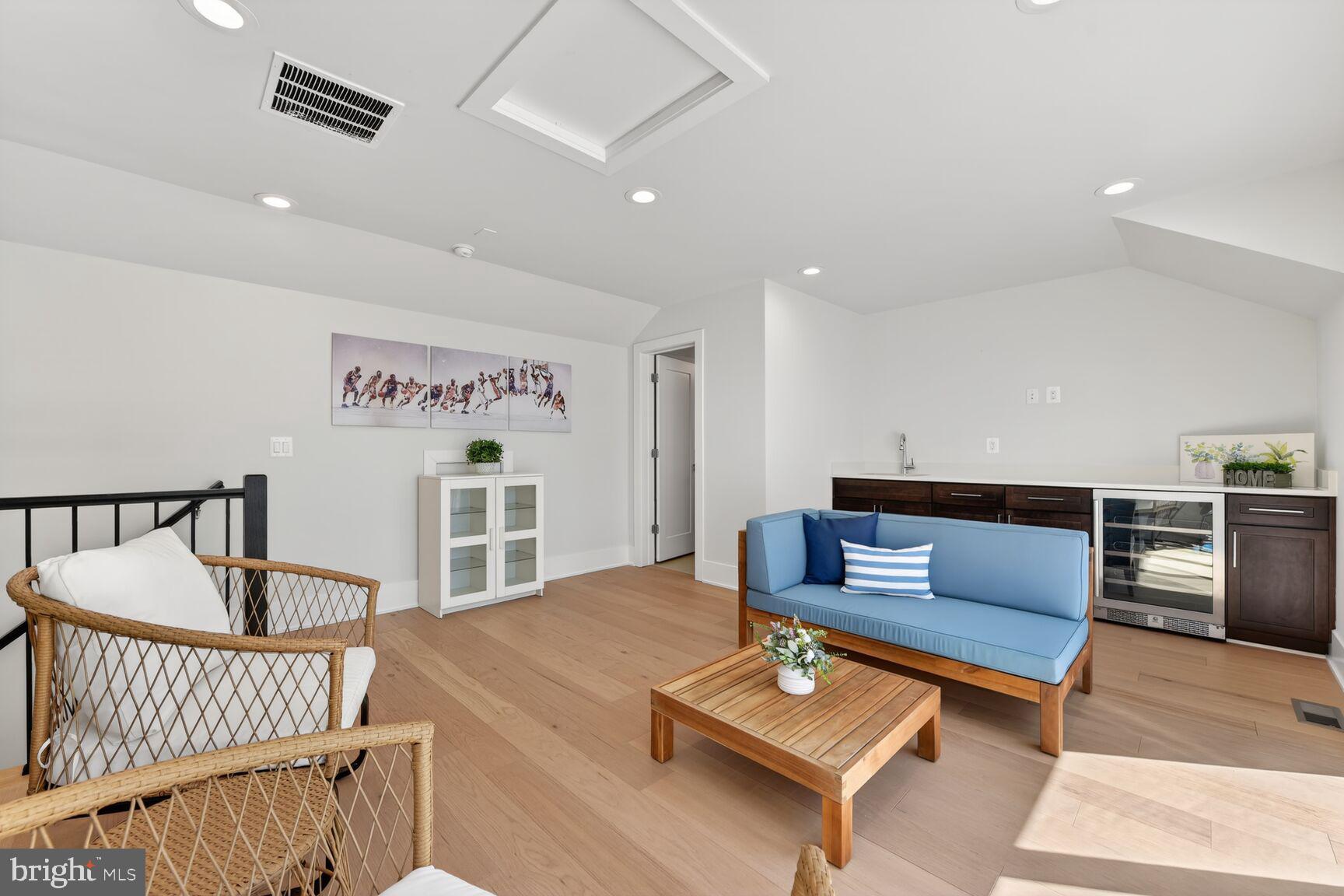 14665 Battery Ridge Lane Centreville, VA 20120 - Photo 42 of 66 a living room with furniture and wooden floor