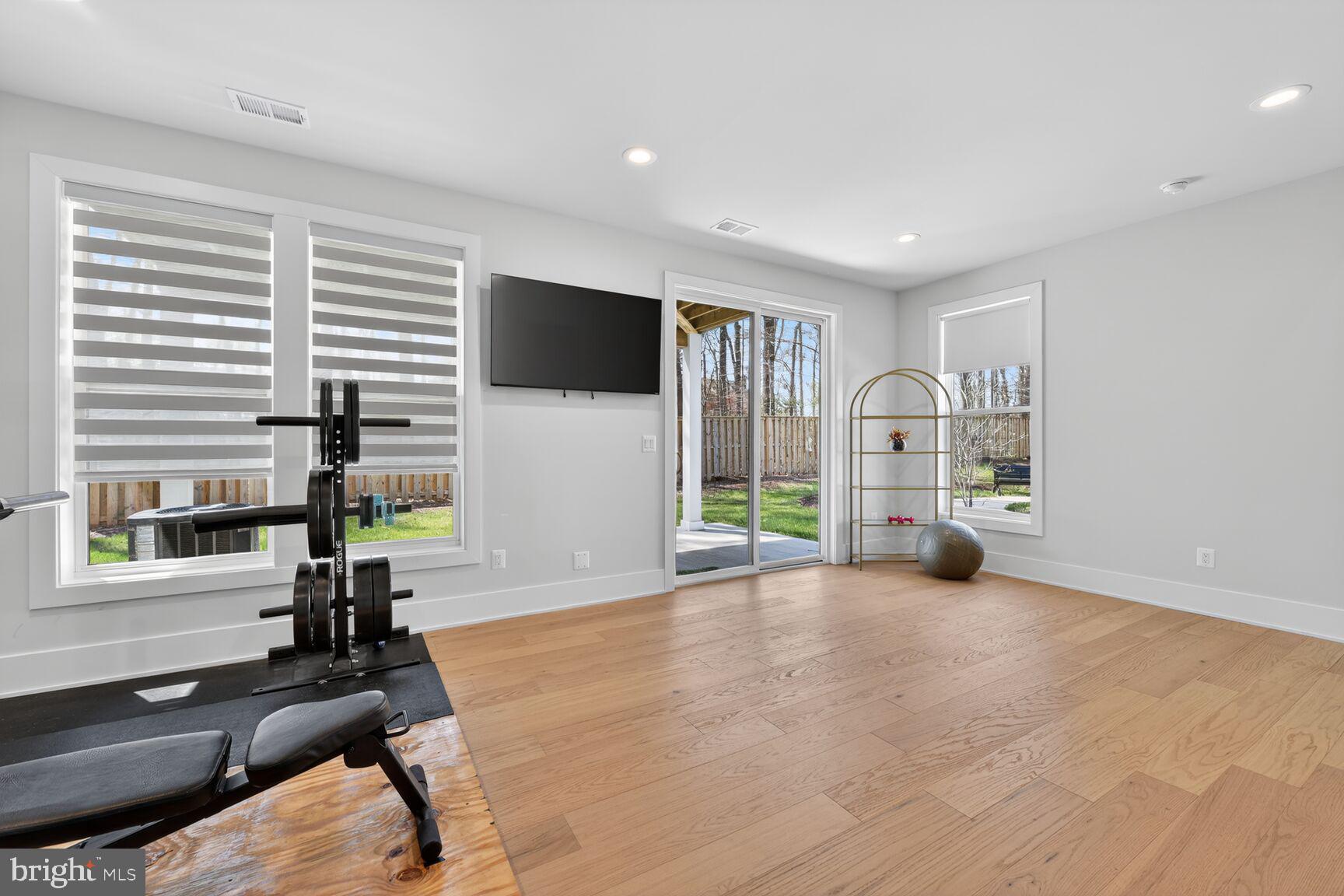 14665 Battery Ridge Lane Centreville, VA 20120 - Photo 48 of 66 a view of a livingroom with a flat screen tv