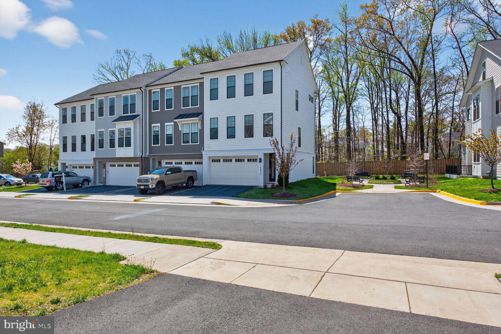 14665 Battery Ridge Lane Centreville, VA 20120 - Photo 55 of 66 a view of building with cars parked on the road