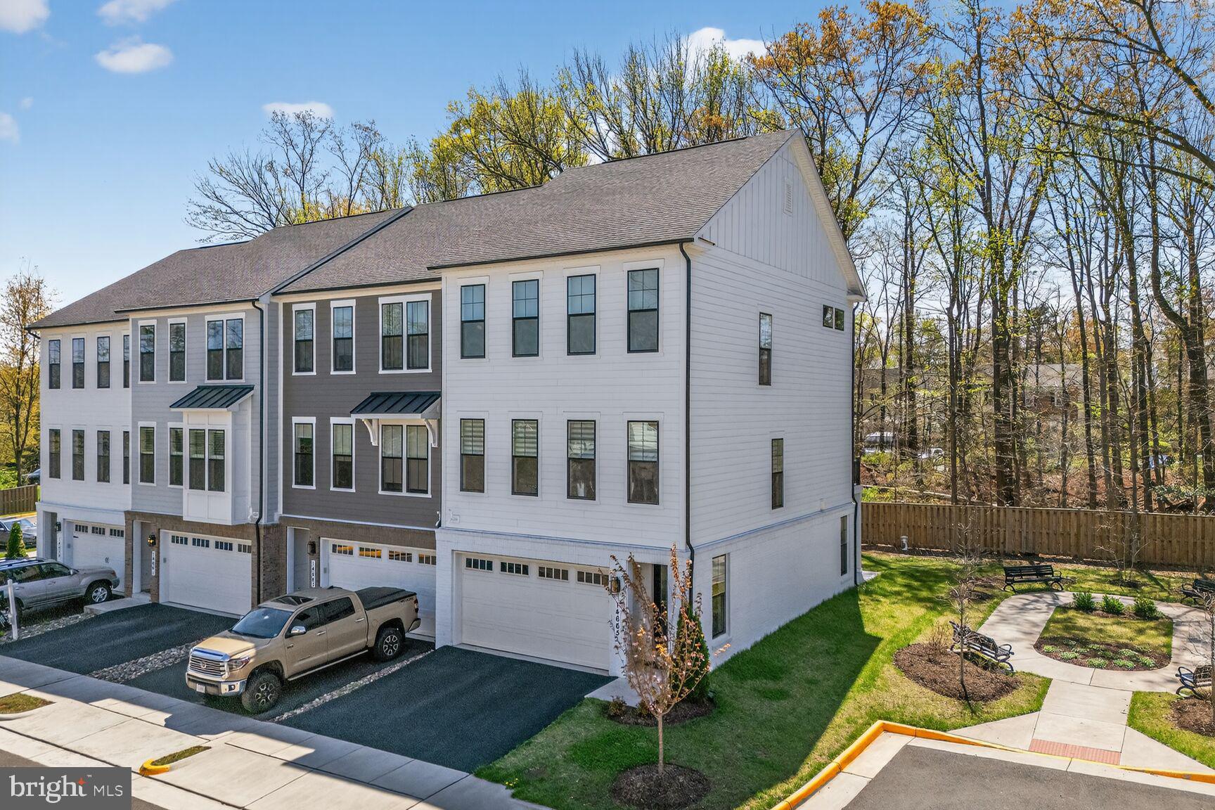 14665 Battery Ridge Lane Centreville, VA 20120 - Photo 57 of 66 a car parked in front of a white house