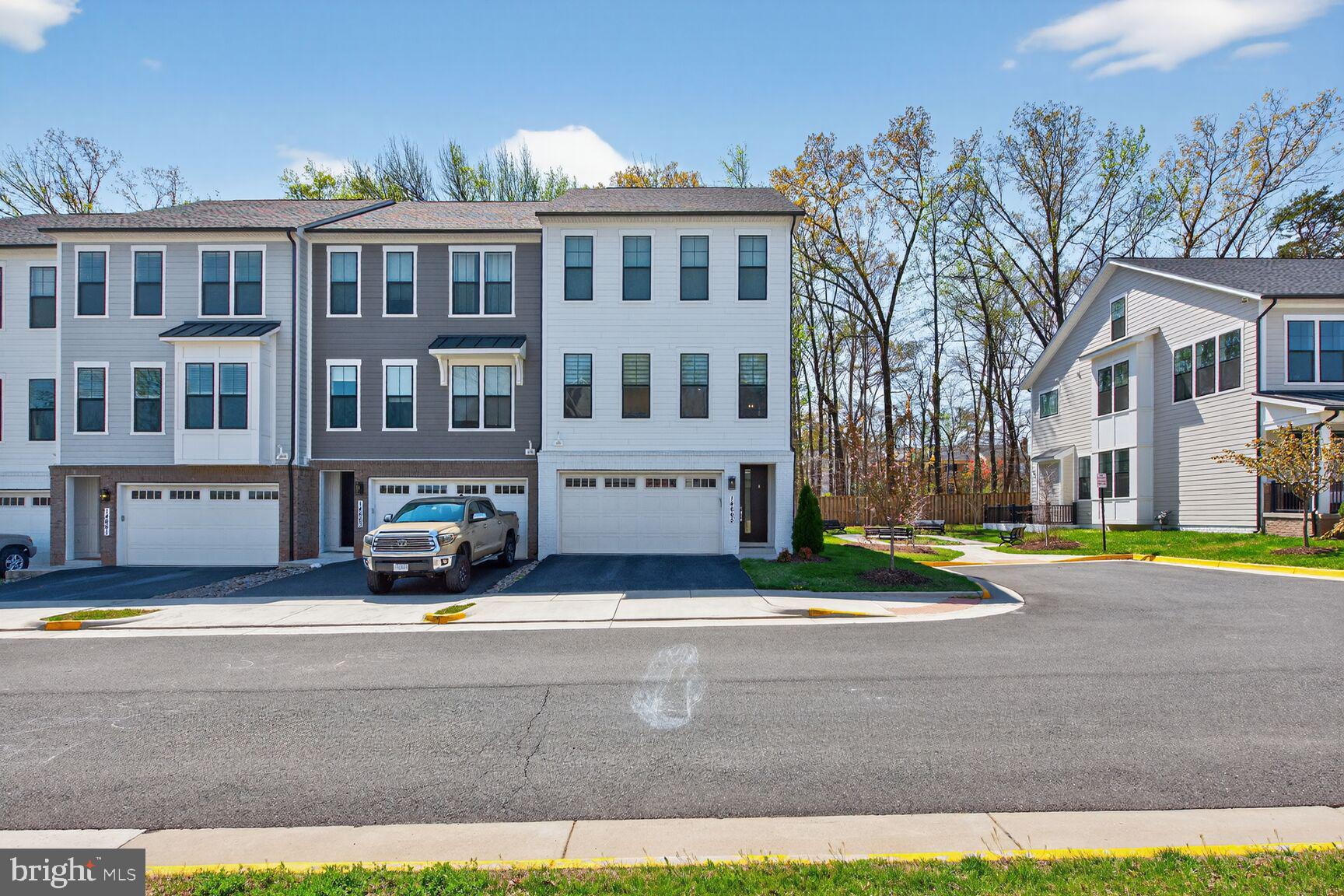14665 Battery Ridge Lane Centreville, VA 20120 - Photo 7 of 66 a view of a building with a yard