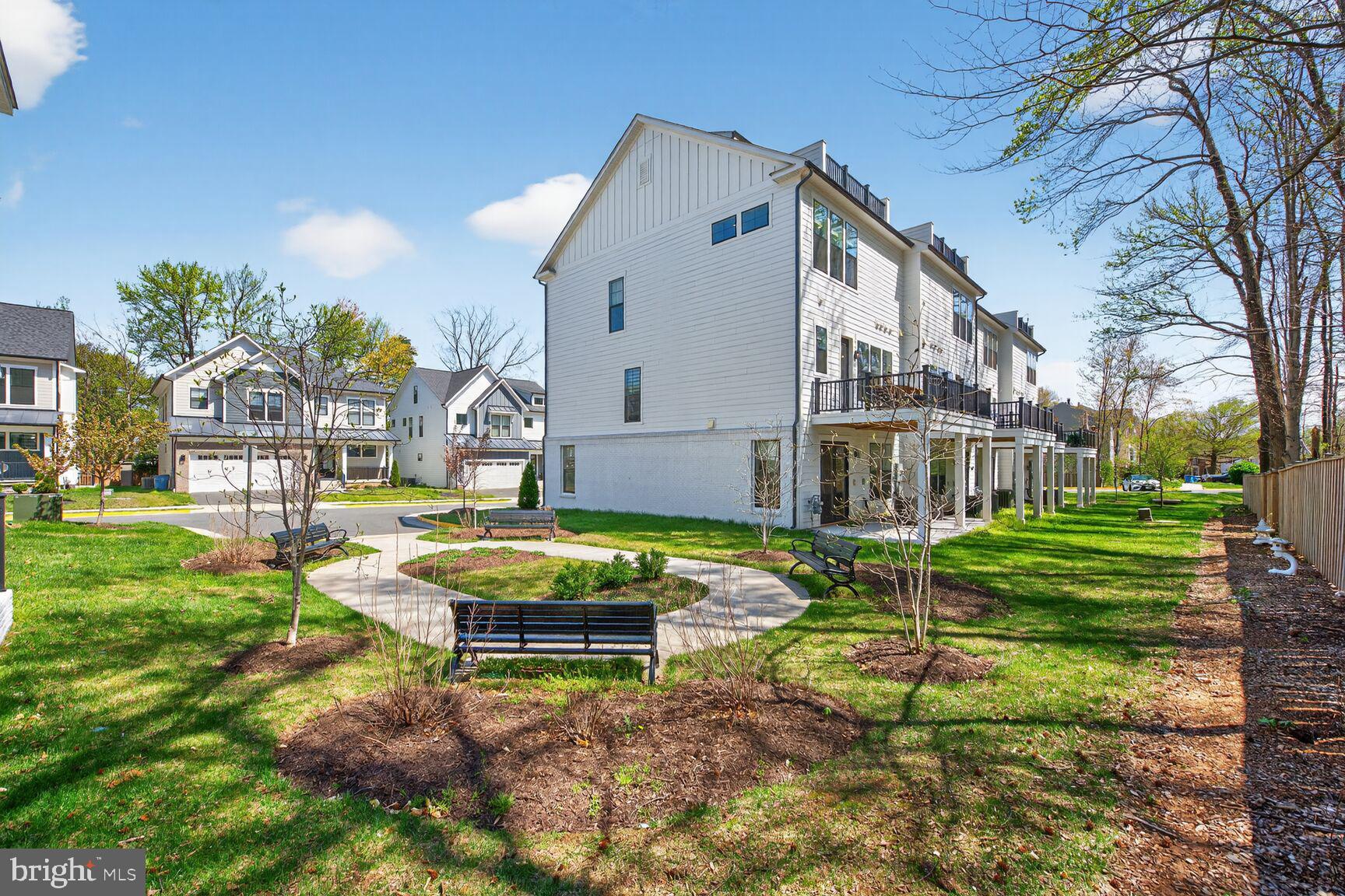 14665 Battery Ridge Lane Centreville, VA 20120 - Photo 9 of 66 a front view of a house with garden