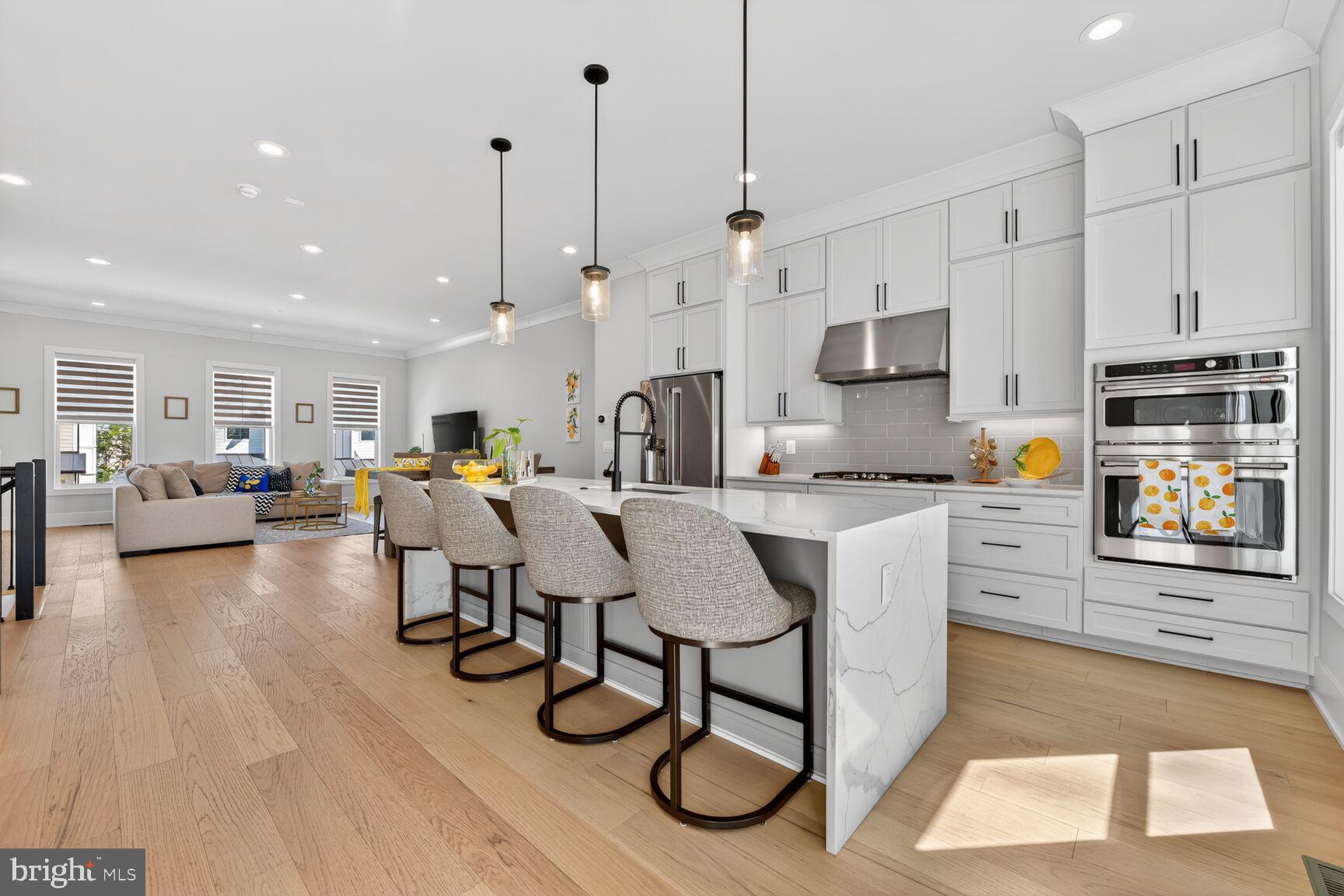14665 Battery Ridge Lane Centreville, VA 20120 - Photo 10 of 66 a large kitchen with lots of counter space and stainless steel appliances