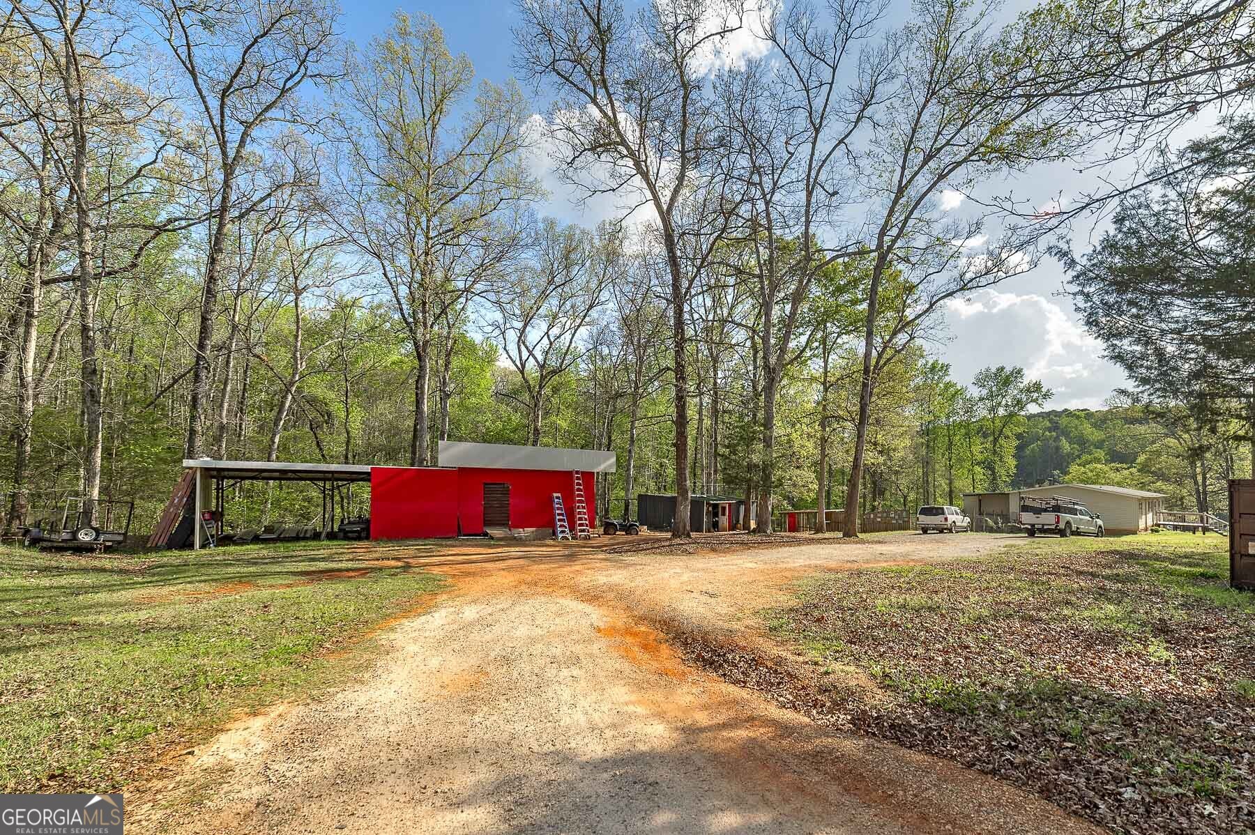 167 Edison Lane Monticello, GA 31064 - Photo 11 of 21 a view of road with large trees