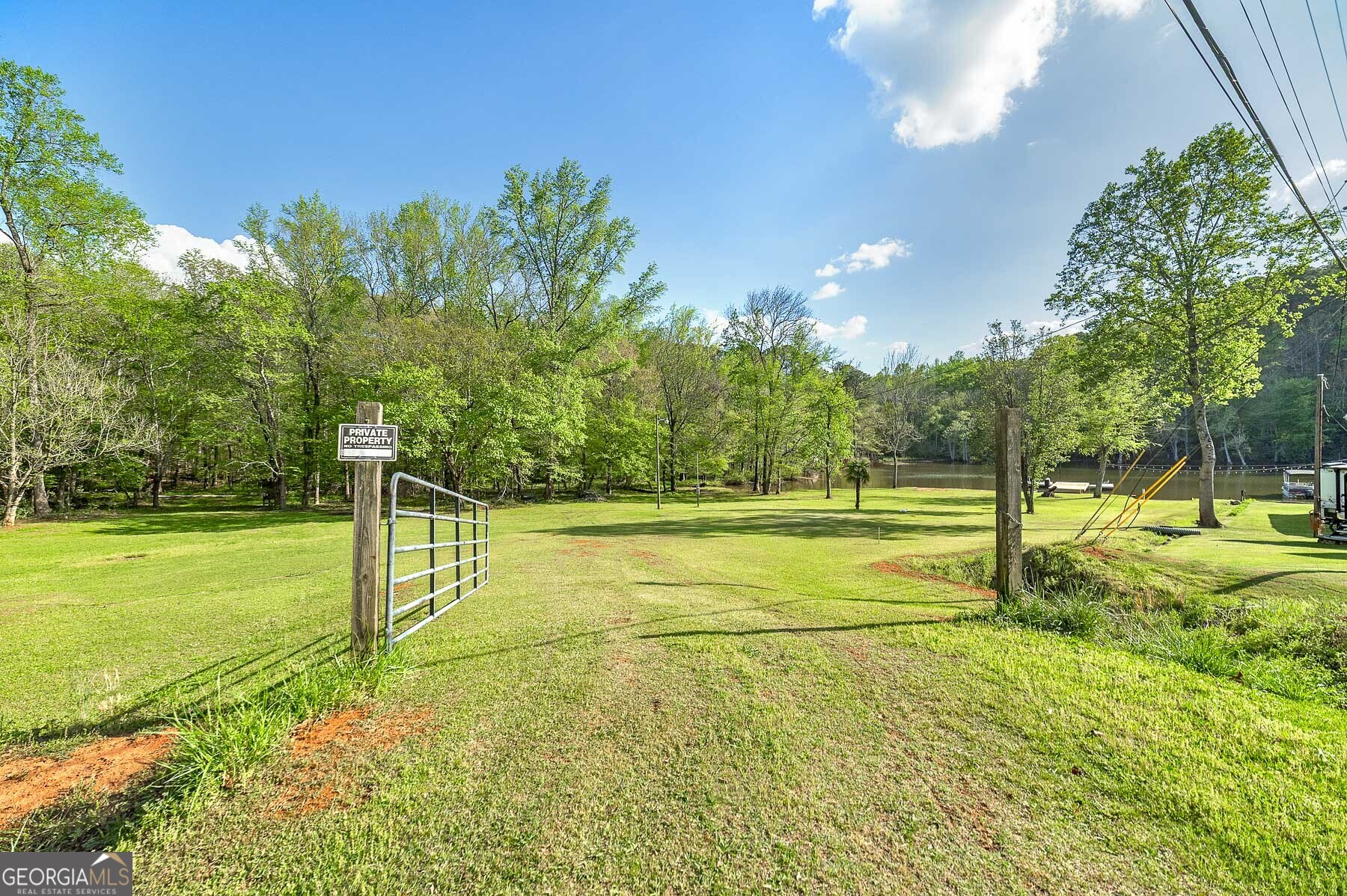 167 Edison Lane Monticello, GA 31064 - Photo 13 of 21 a view of a swimming pool with a yard