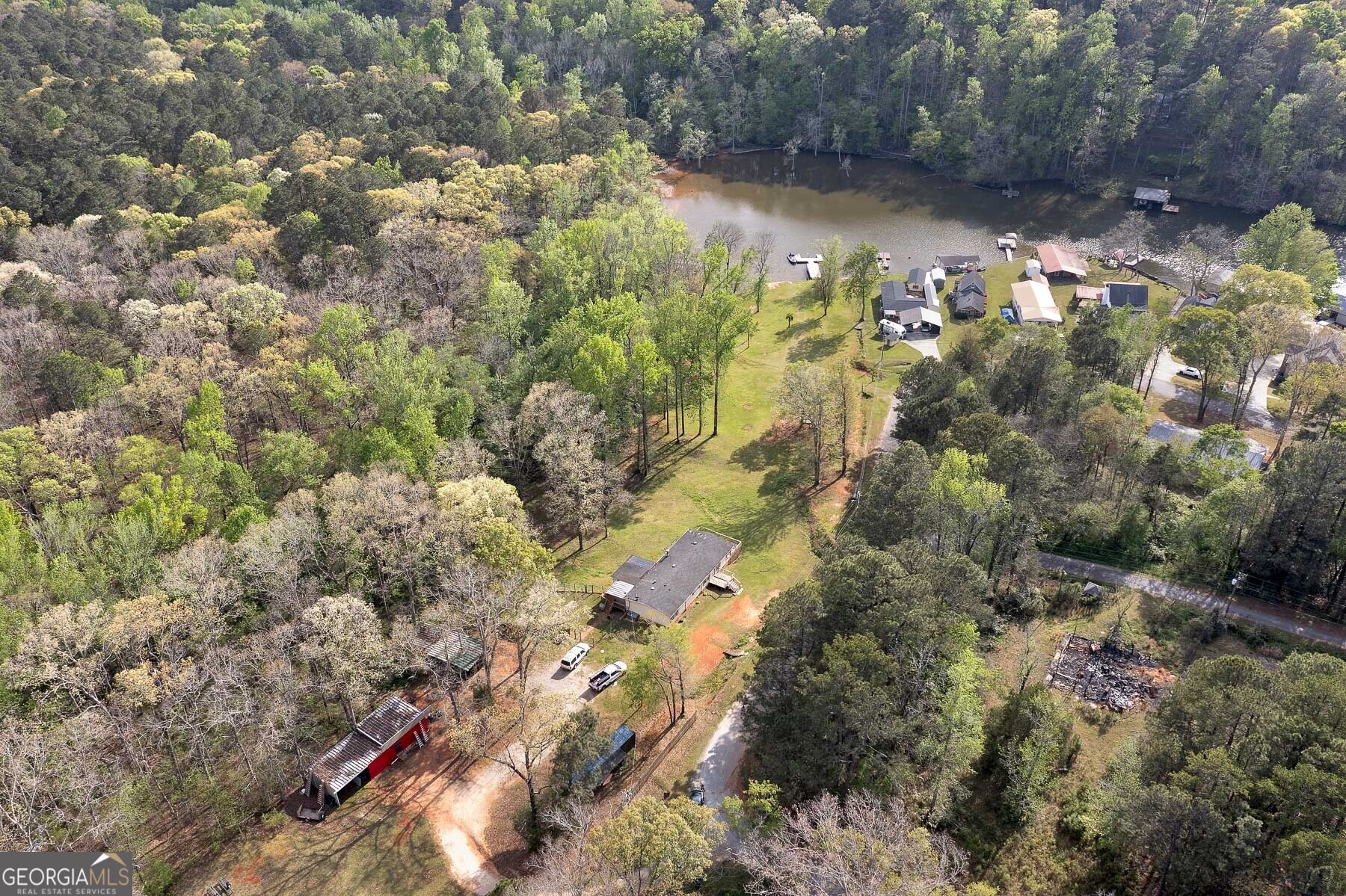 167 Edison Lane Monticello, GA 31064 - Photo 5 of 21 a view of a street with houses