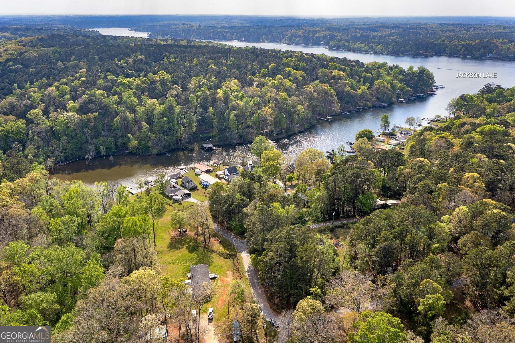 167 Edison Lane Monticello, GA 31064 - Photo 7 of 21 a view of a lake with mountains in background
