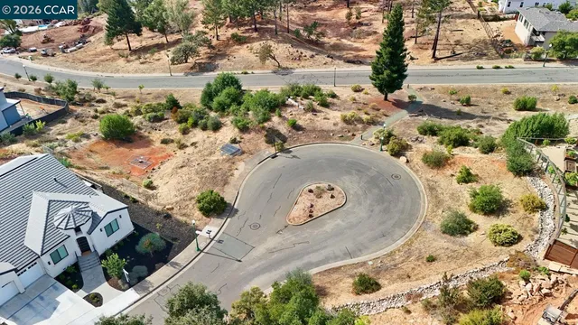 an aerial view of residential house with outdoor space