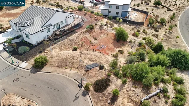 an aerial view of residential building with parking space