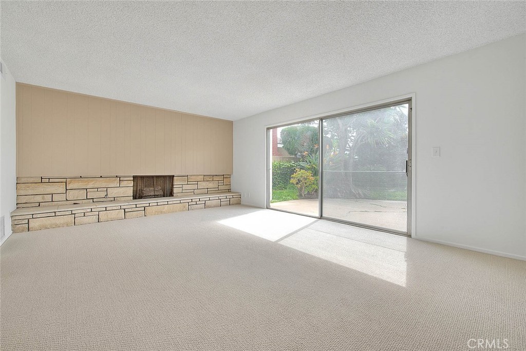 4408 Elder Avenue Seal Beach, CA 90740 - Photo 34 of 73 a view of a living room hardwood floor and a large window