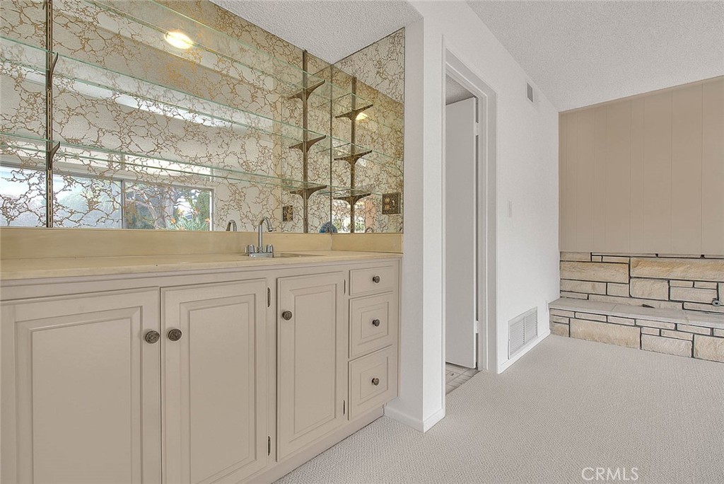 4408 Elder Avenue Seal Beach, CA 90740 - Photo 37 of 73 a view of a closet area with white doors