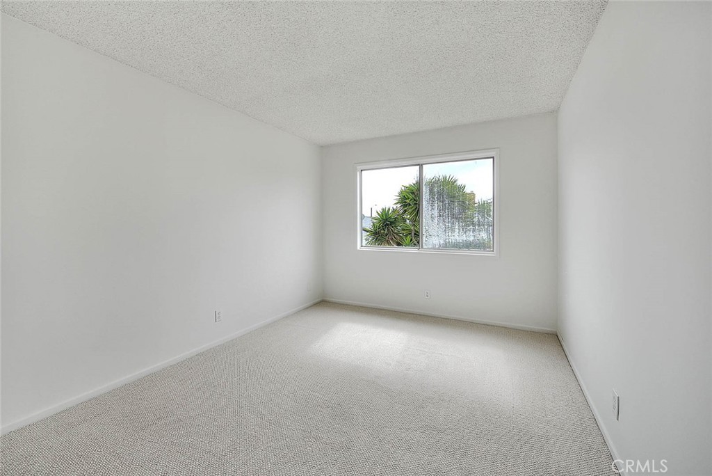 4408 Elder Avenue Seal Beach, CA 90740 - Photo 65 of 73 an empty room with windows