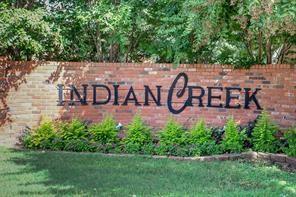 953 Roaring Springs Road Fort Worth, TX 76114 - Photo 1 of 1 a view of park with bench and trees