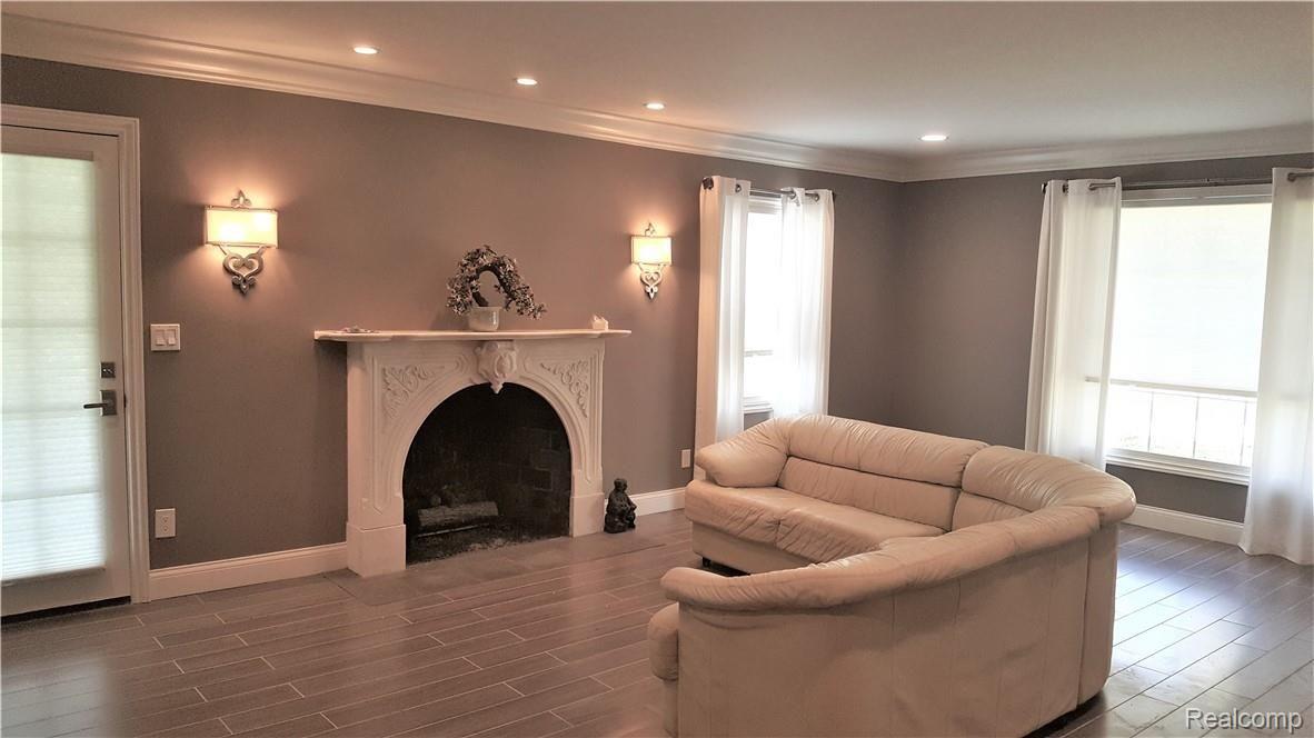 25555 Meridian Road Grosse Ile, MI 48138 - Photo 15 of 58 Imported marble fireplace in living room.