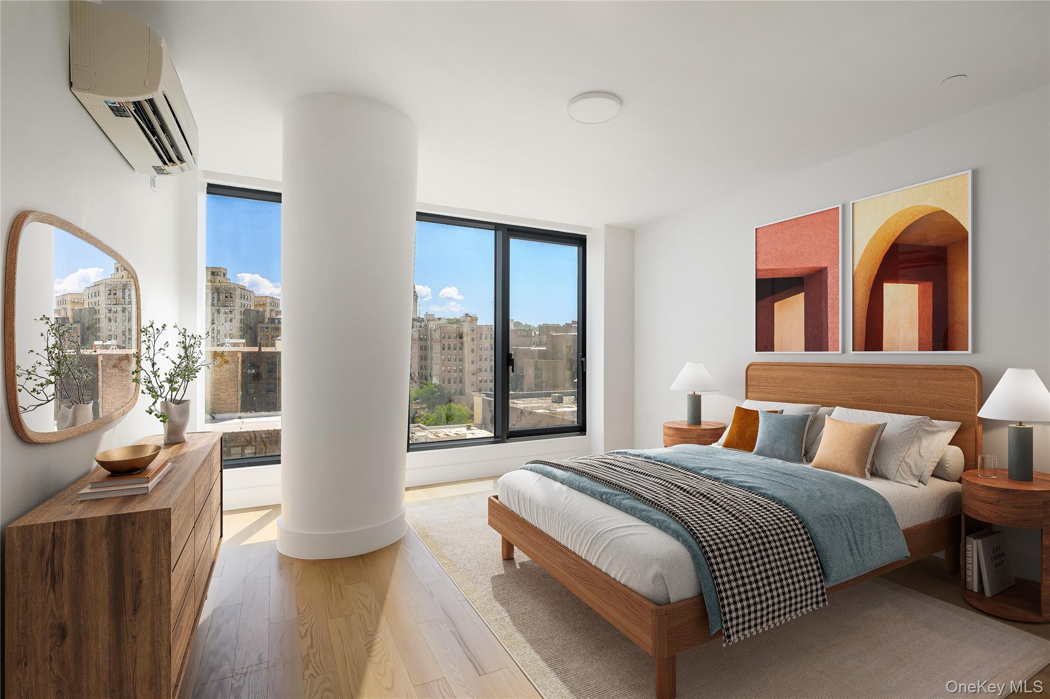 a bedroom with a balcony a bed and a dresser next to a window