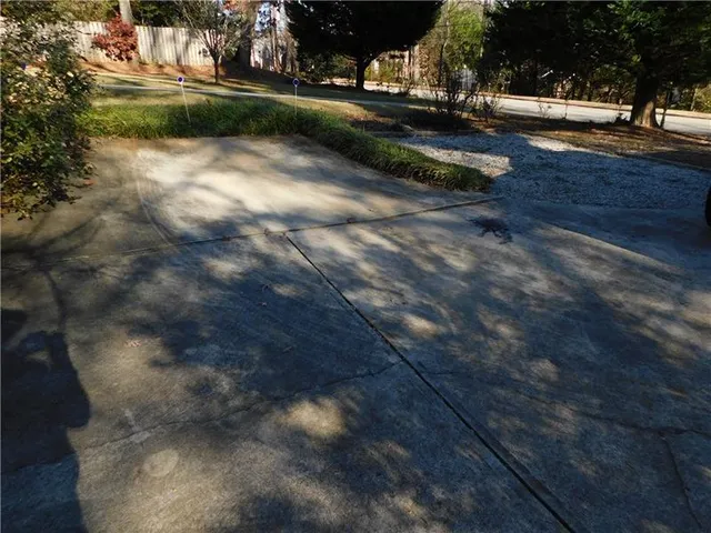 a view of back yard of green space