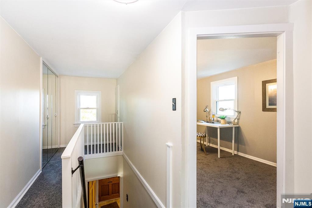27 Gillespie Road Bloomfield, NJ 07003 - Photo 16 of 25 a view of a livingroom with a chair