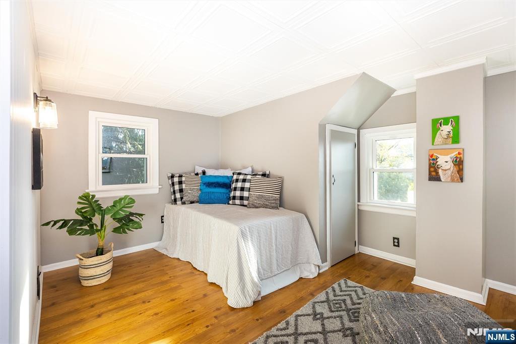 27 Gillespie Road Bloomfield, NJ 07003 - Photo 17 of 25 a bedroom with a bed and a window