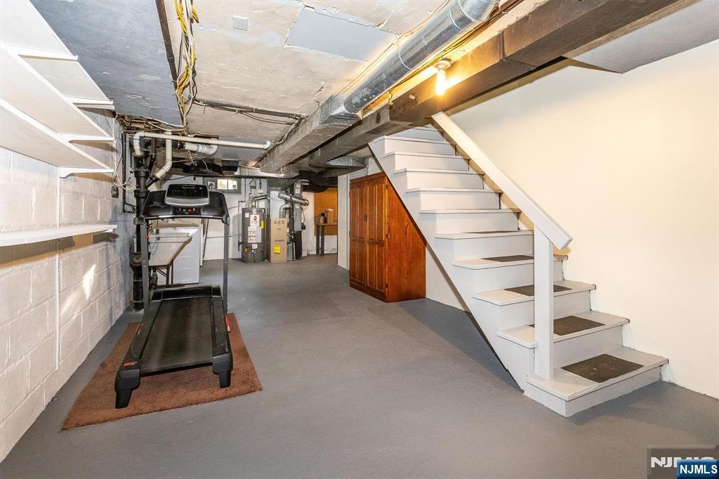 27 Gillespie Road Bloomfield, NJ 07003 - Photo 20 of 25 a view of an empty room with stairs