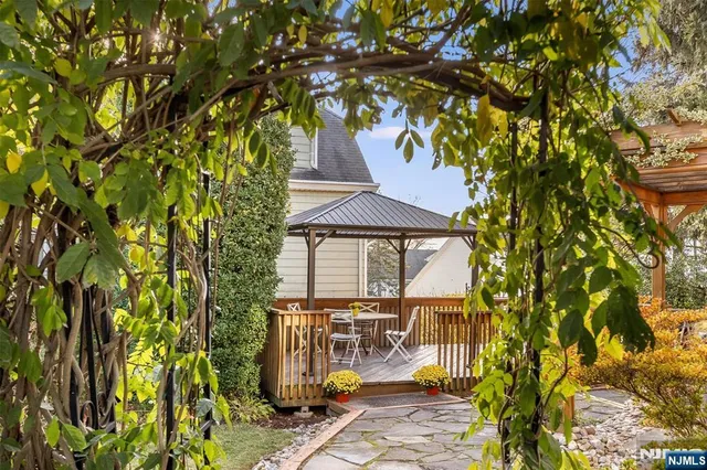 a view of balcony with a tree