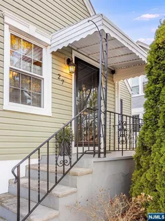 a view of a house with a street