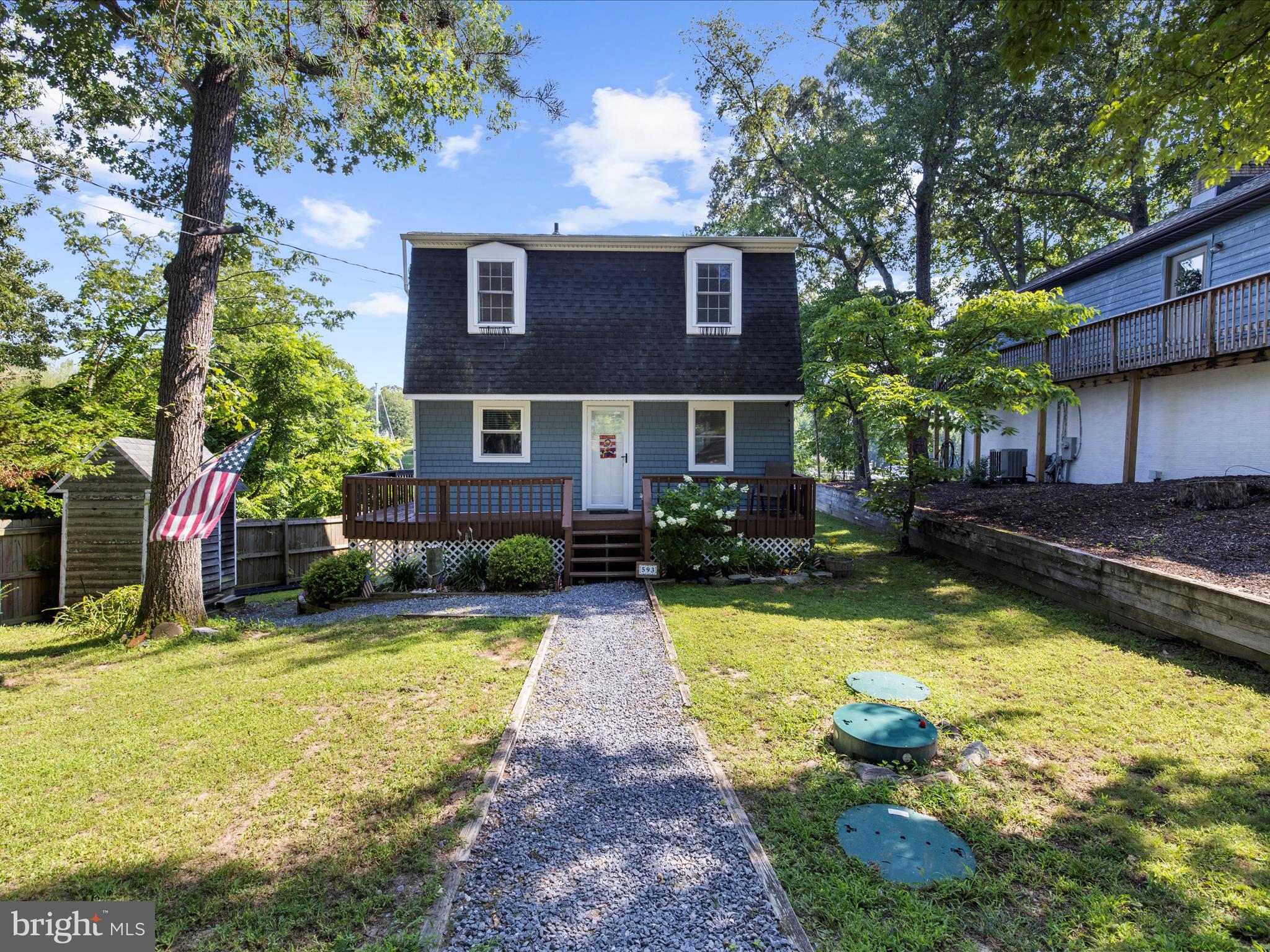 593 Riverside Drive Pasadena, MD 21122 - Photo 2 of 56 a house with swimming pool