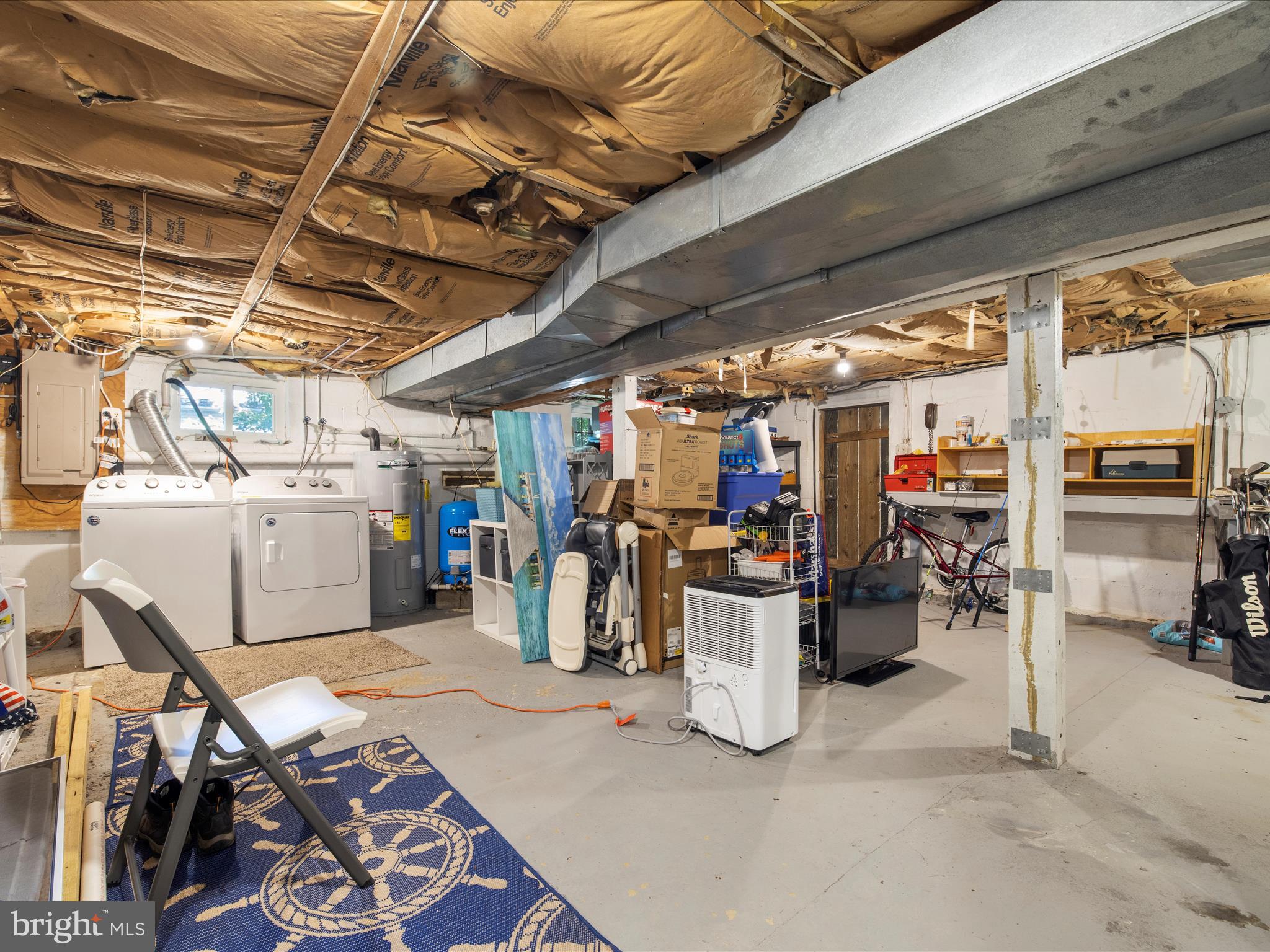 593 Riverside Drive Pasadena, MD 21122 - Photo 22 of 56 a view of a storage room with a lot of stuff