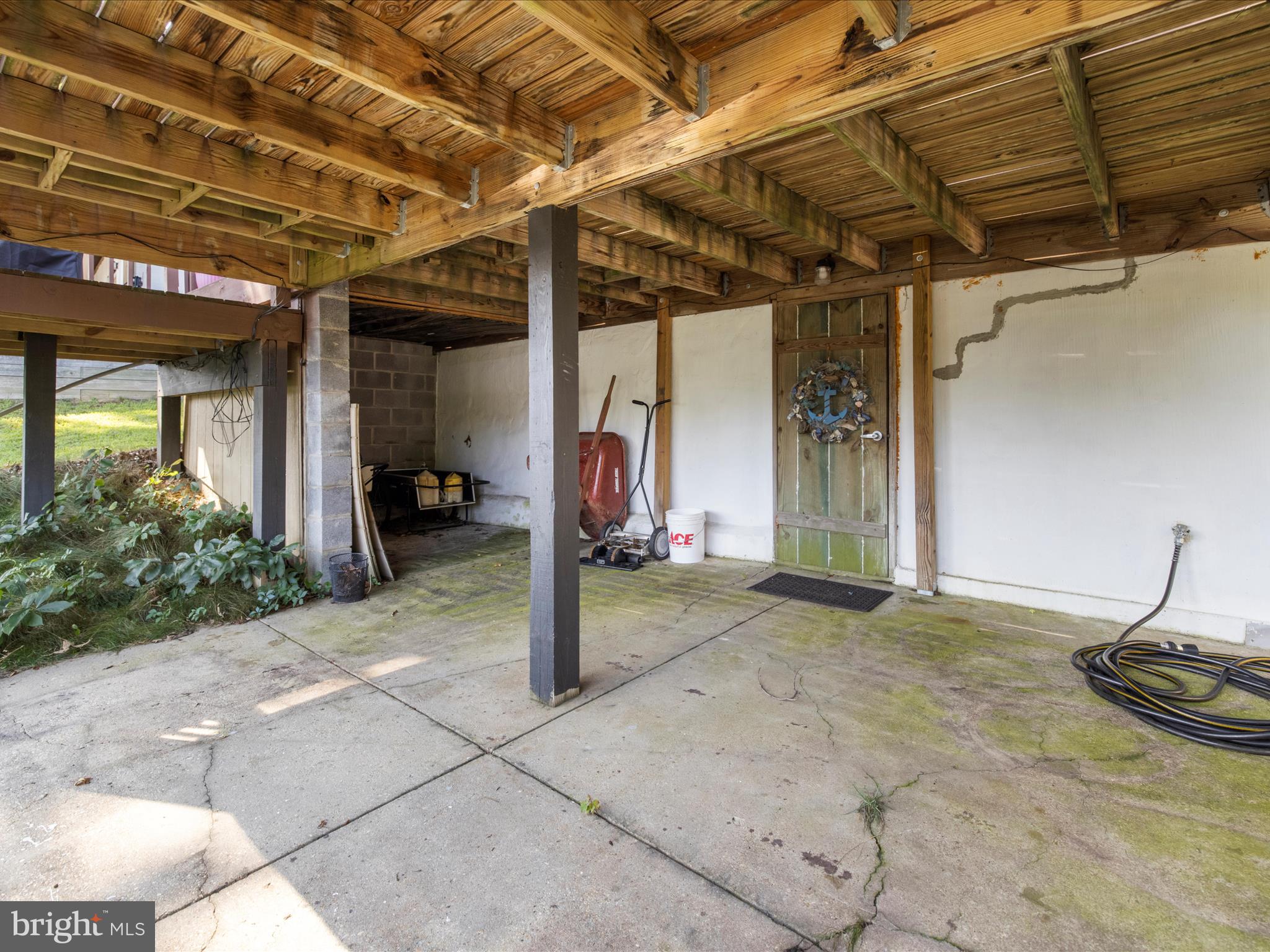 593 Riverside Drive Pasadena, MD 21122 - Photo 26 of 56 a view of a room with wooden floor