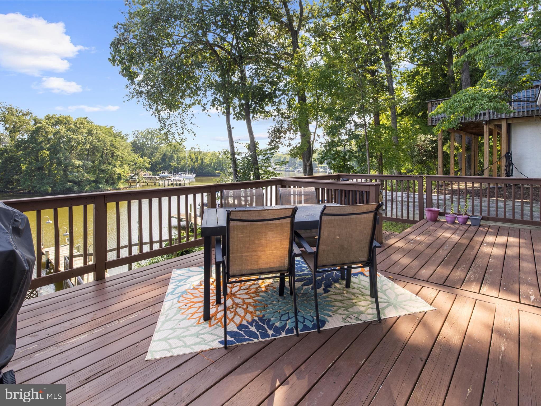 593 Riverside Drive Pasadena, MD 21122 - Photo 27 of 56 a view of a chairs on a deck