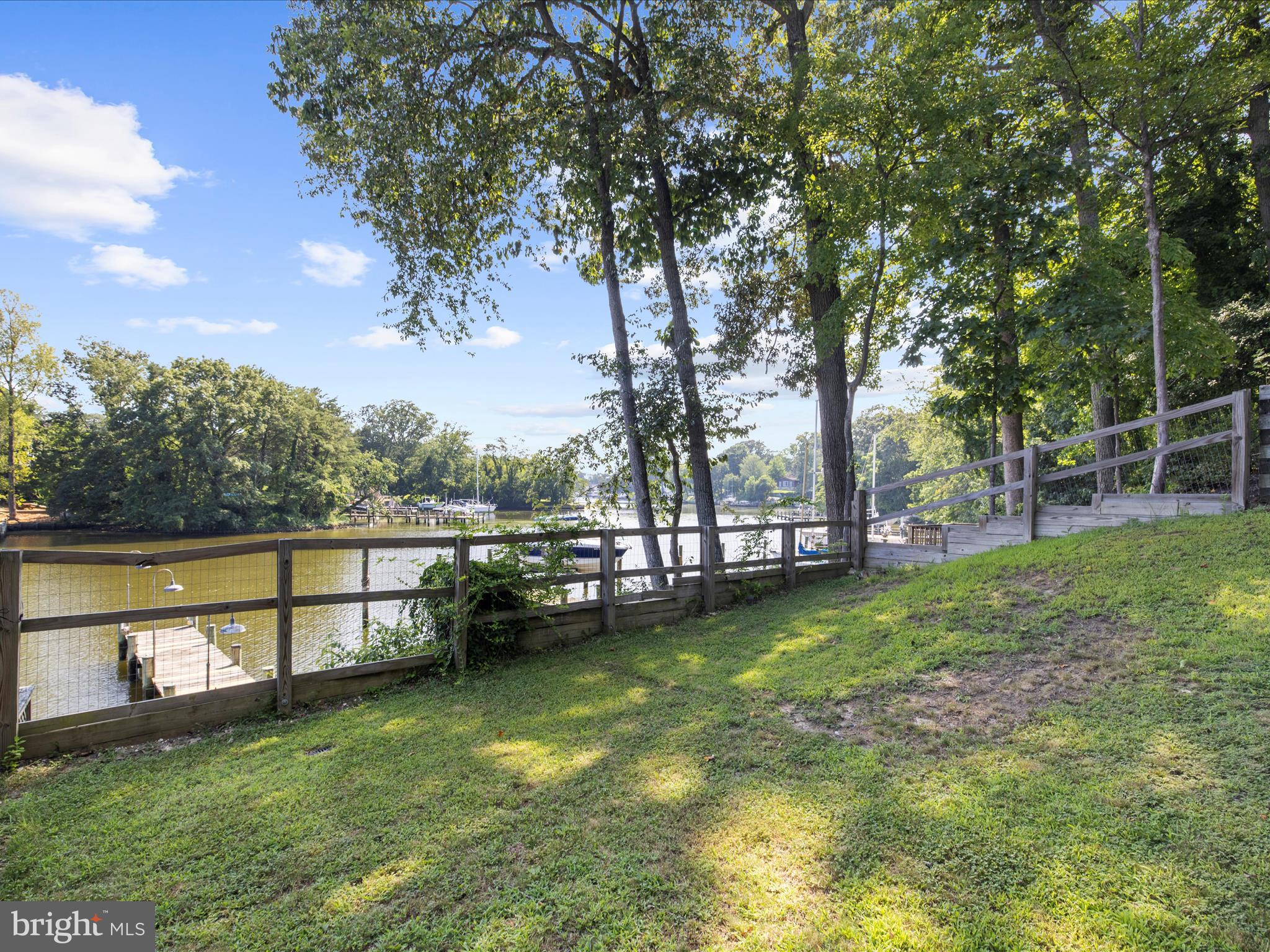 593 Riverside Drive Pasadena, MD 21122 - Photo 32 of 56 a view of a garden with swimming pool