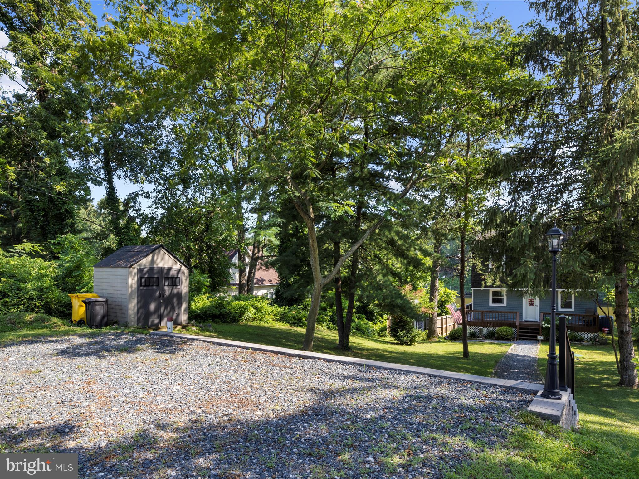 593 Riverside Drive Pasadena, MD 21122 - Photo 4 of 56 a view of a park with large trees