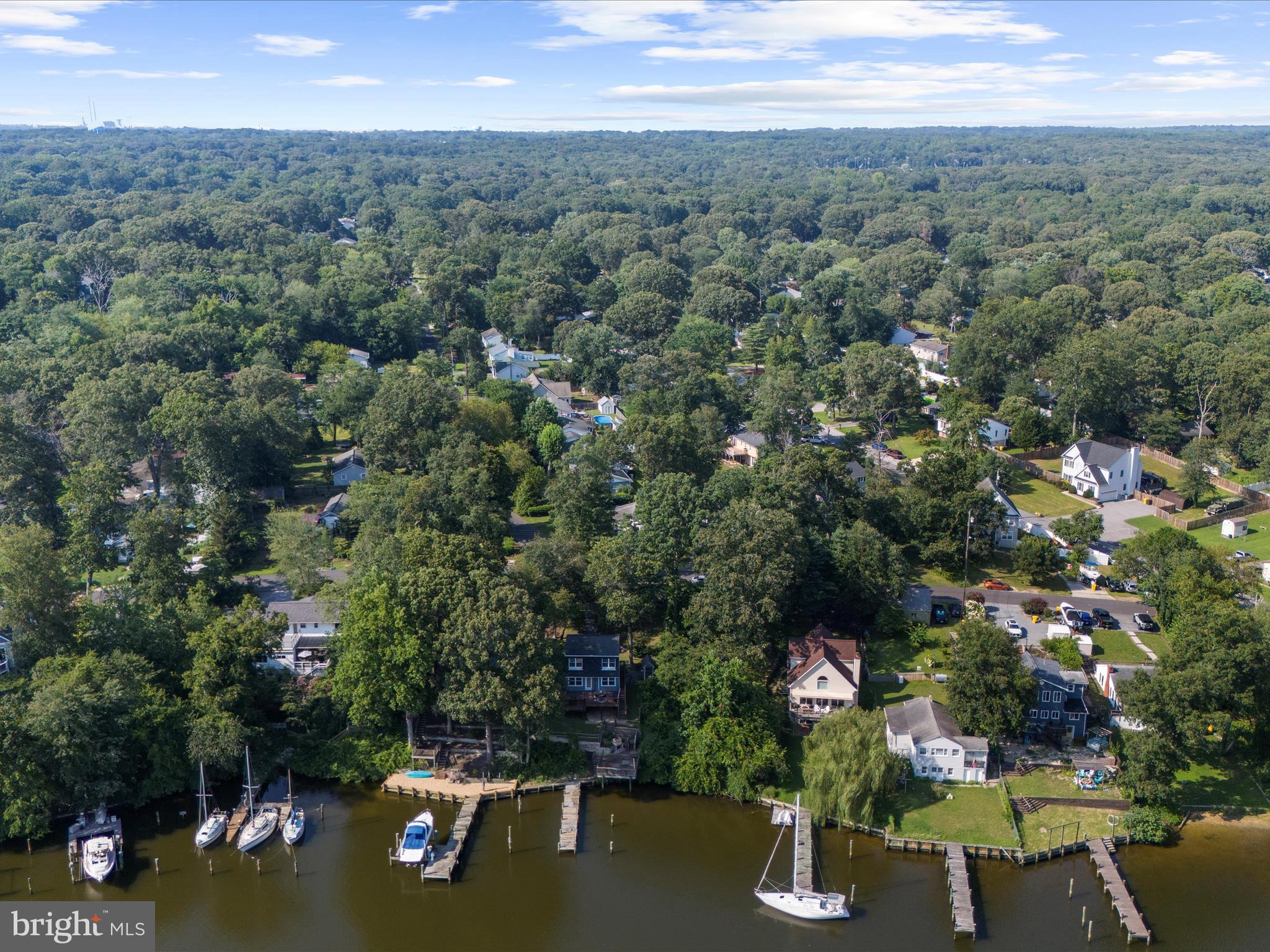 593 Riverside Drive Pasadena, MD 21122 - Photo 41 of 56 an aerial view of houses with yard
