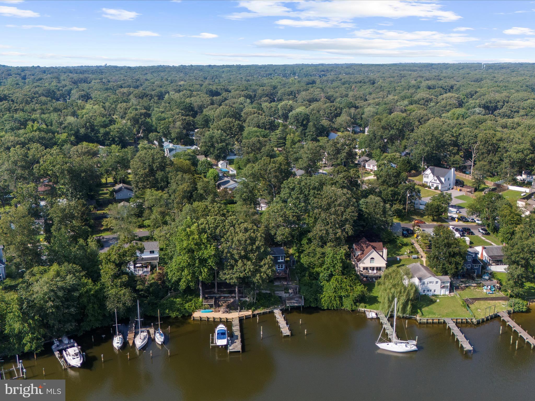 593 Riverside Drive Pasadena, MD 21122 - Photo 42 of 56 an aerial view of a houses with a yard