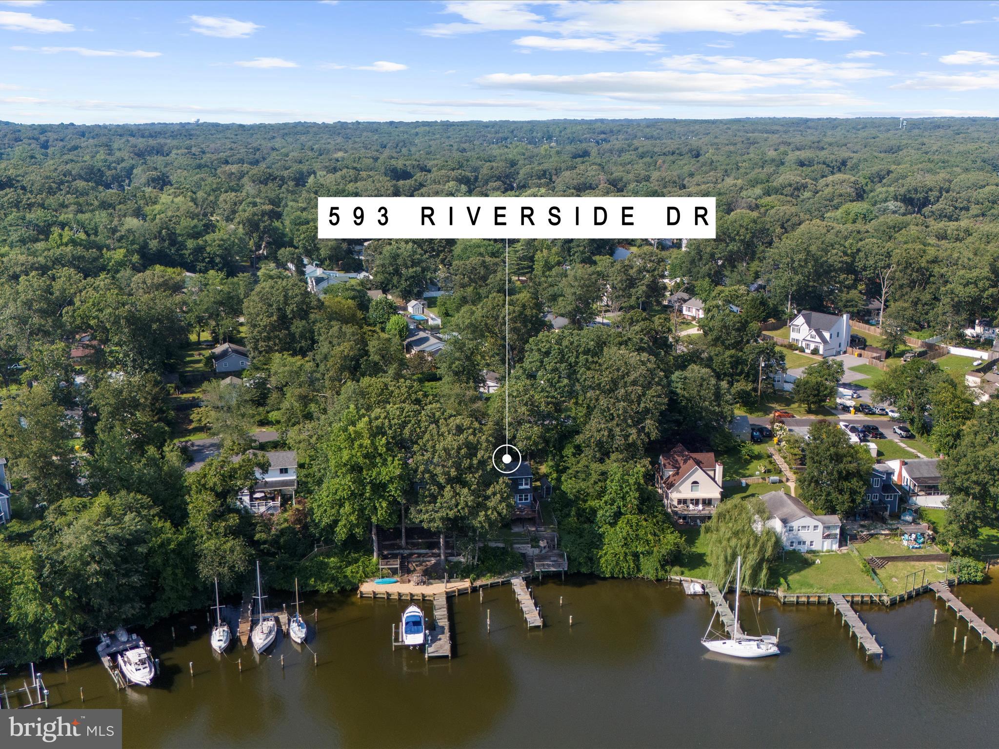 593 Riverside Drive Pasadena, MD 21122 - Photo 48 of 56 an aerial view of a house with a yard basket ball court and outdoor seating