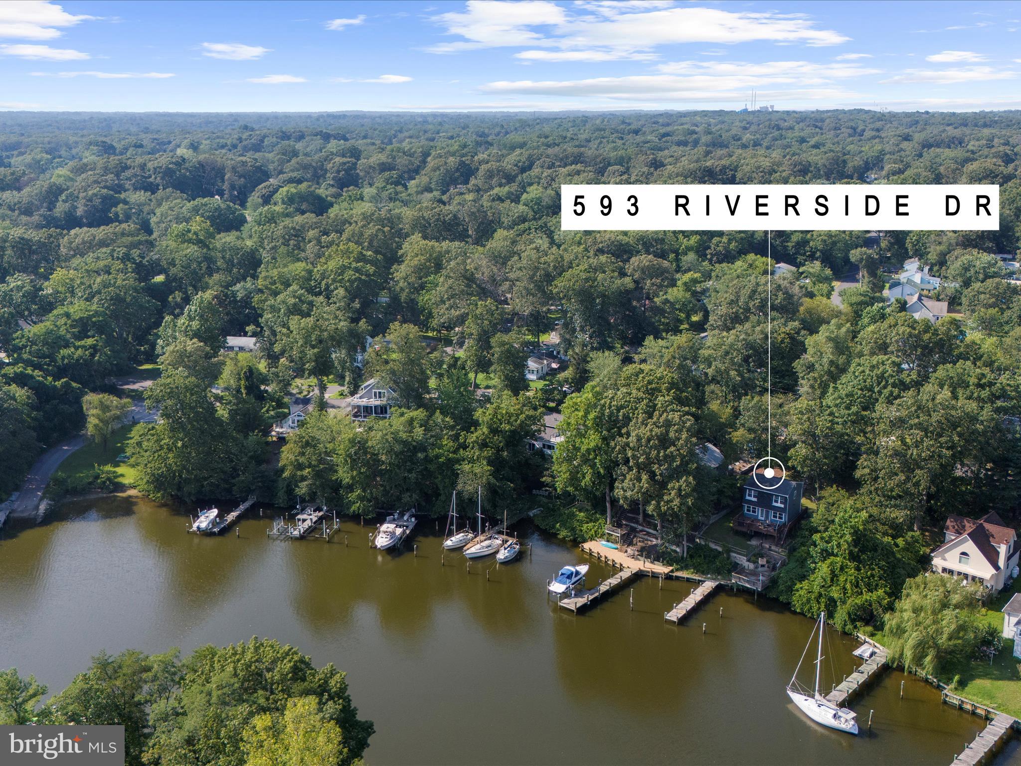 593 Riverside Drive Pasadena, MD 21122 - Photo 49 of 56 an aerial view of a city with lots of residential buildings ocean and mountain view