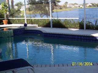733 Northwest Waterlily Place Stuart, FL 34994 - Photo 3 of 5 a view of a street with a bench in front of it