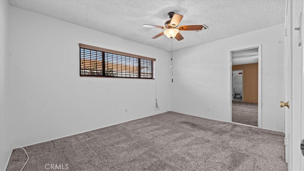 27196 10th Street Highland, CA 92346 - Photo 16 of 42 an empty room with a window