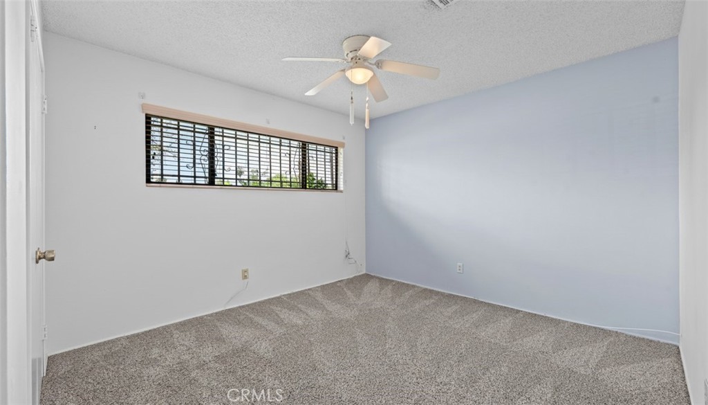 27196 10th Street Highland, CA 92346 - Photo 20 of 42 a view of an empty room with a window