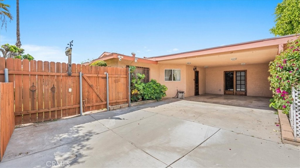 27196 10th Street Highland, CA 92346 - Photo 27 of 42 a view of a house with a garage